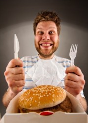 man eating burger